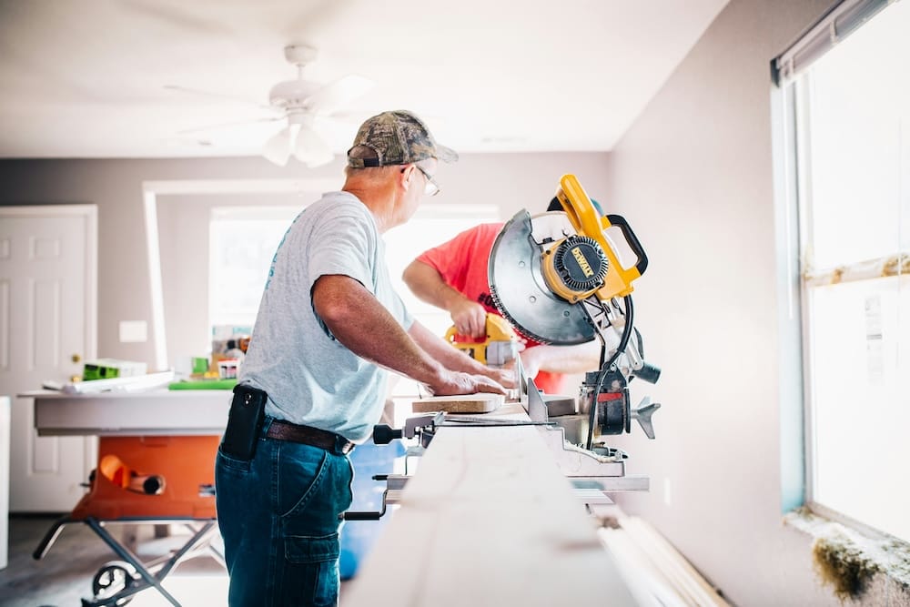 Older man helping with a project